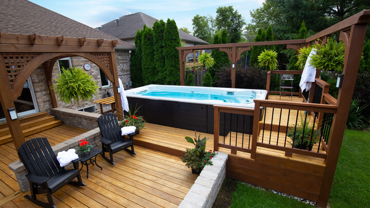 swimlife swim spa installation with deck surround